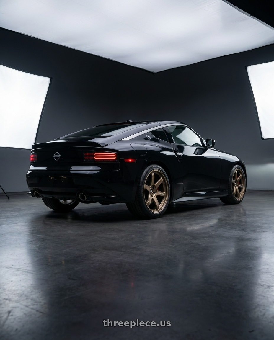 2026 Nissan 400 z with Volk Racing TE37 ULTRA M-SPEC 5x114.3 19x9.5 +22 BLAST BRONZE wheels rear three quarter view square tires