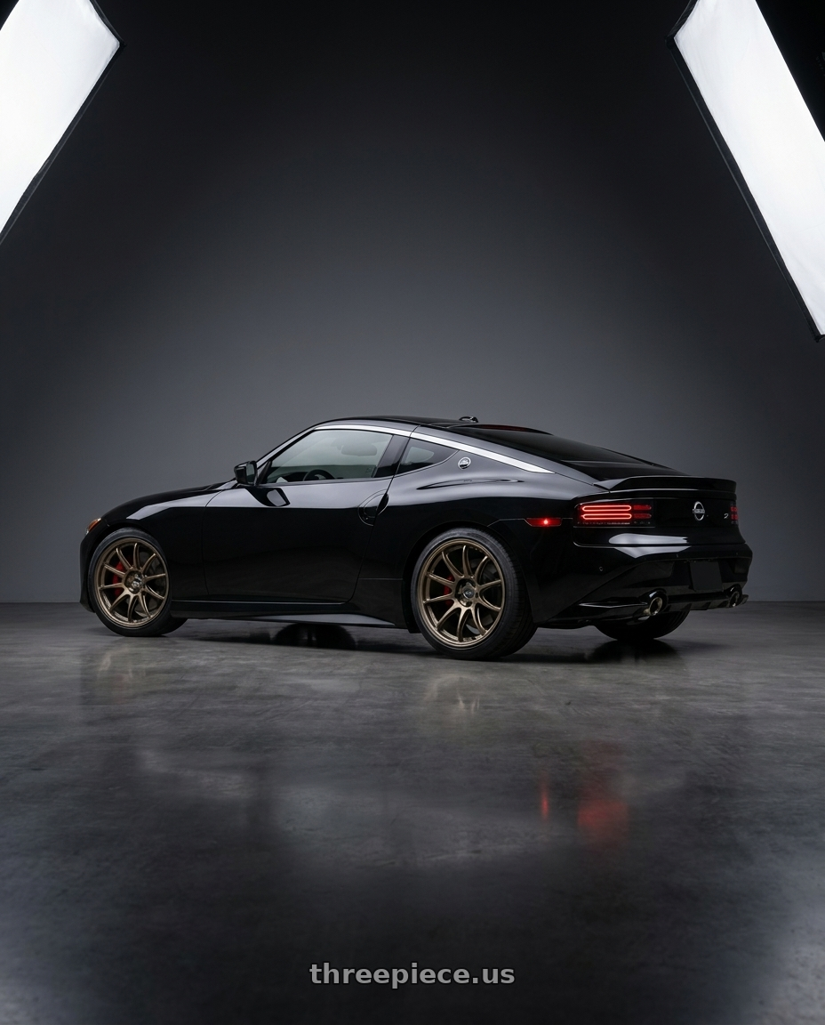 2034 nissan z with Work Zr10 2P 5x114.3 19x9.5 +18 Matte Bronze wheels rear three quarter view square tires