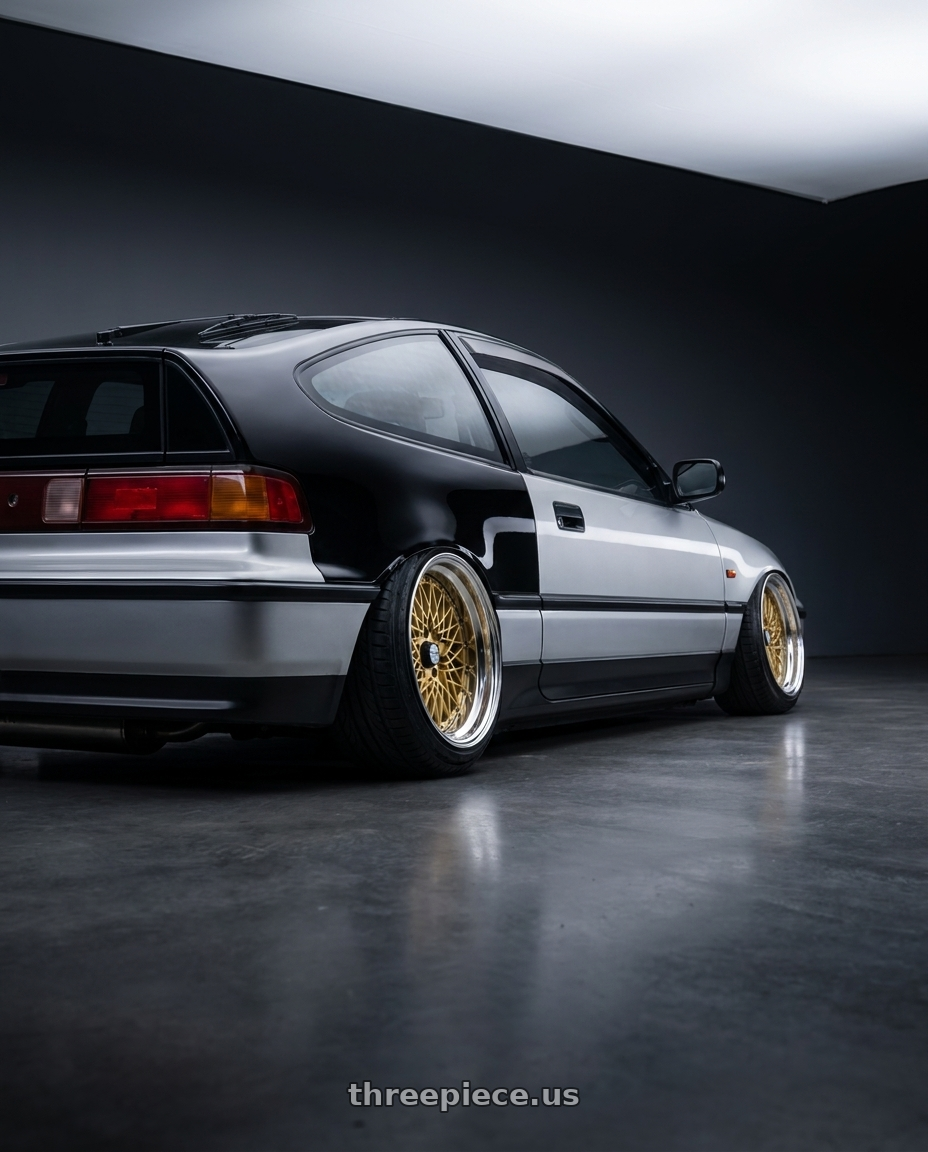 1990 Honda CRX with SSR Formula MESH 4X100 16X9.5+32 NR Disk Fm Gold wheels rear three quarter view extreme stretch tires