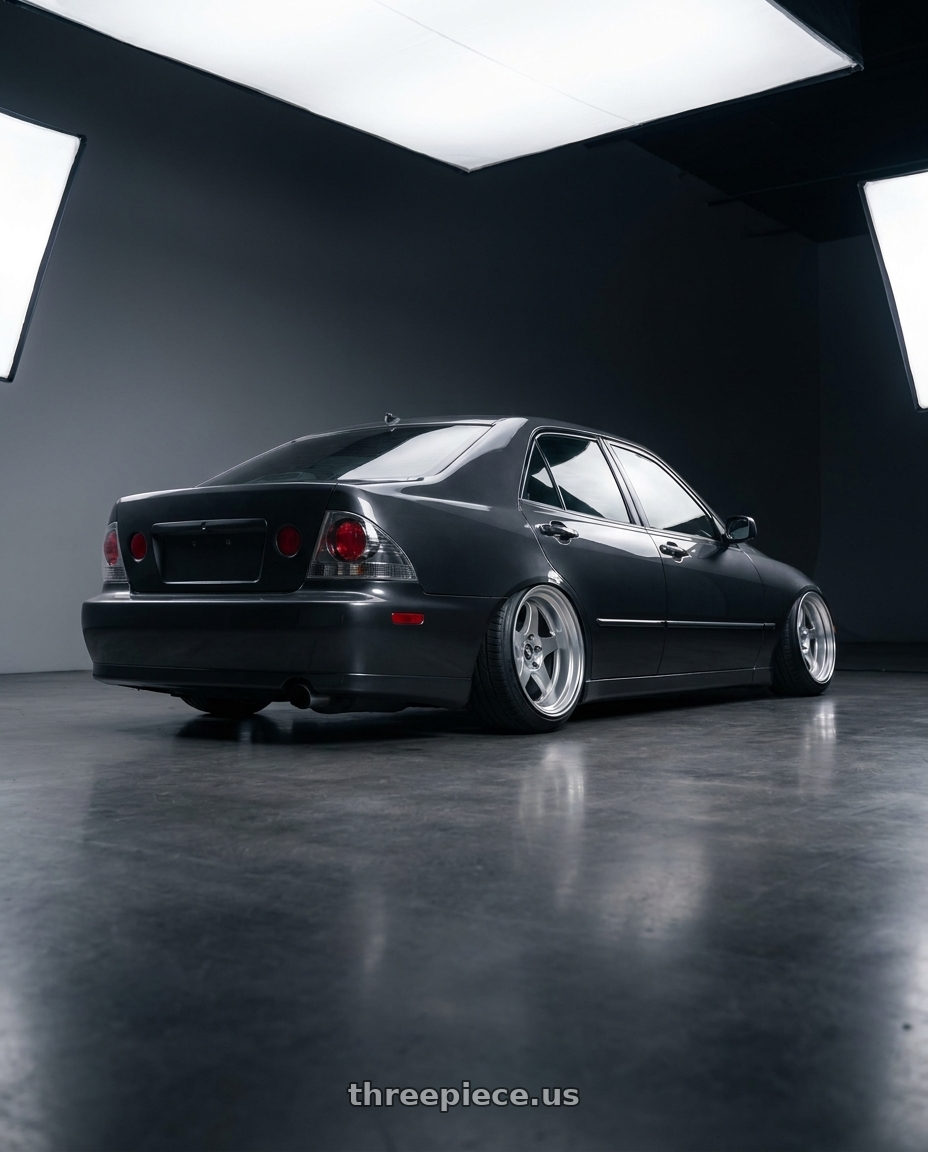 2003 lexus is300 sedan with ESR Wheels APEX SERIES AP8 5x114.3 18x10.5 +22 Hyper Silver wheels rear three quarter view extreme stretch tires