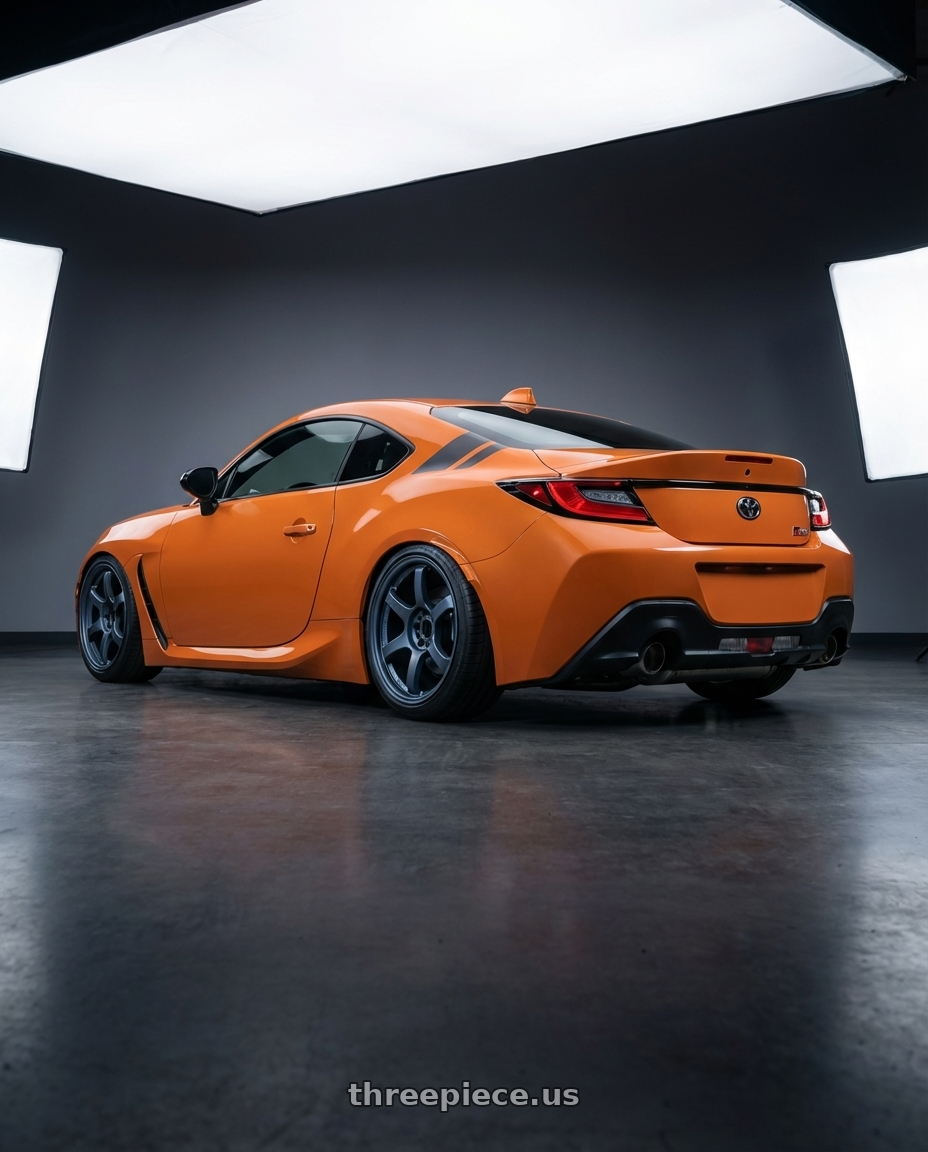 2023 gr86 10th anniversary  with Gram Lights 57DR 5x108 18x8.5 +37 GUNBLUE 2 wheels rear three quarter view slight stretch tires