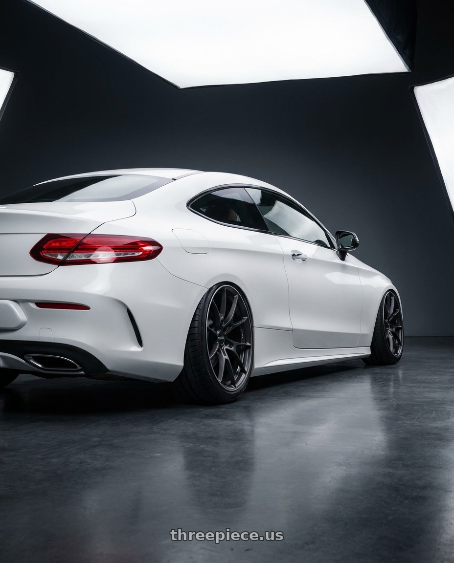 2017 c300 coupe white with Volk Racing G025 5x114.3 19x9.5+22 Matte Gunblack / Rim Edge DC wheels rear three quarter view extreme stretch tires