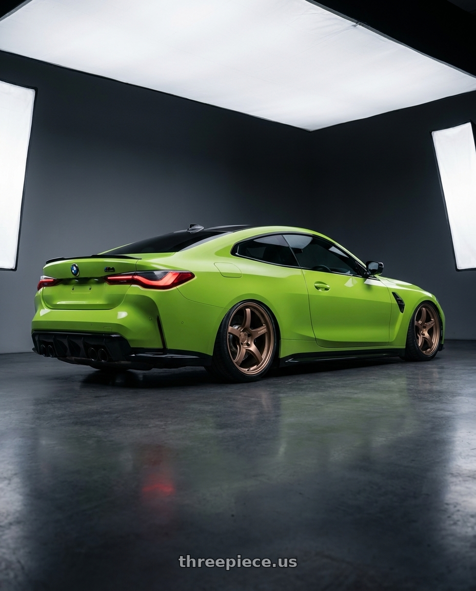 2024 BMW M4 G82 with Gram Lights 57CR 5x112 19x10.5+35 Bronze II wheels rear three quarter view slight stretch tires