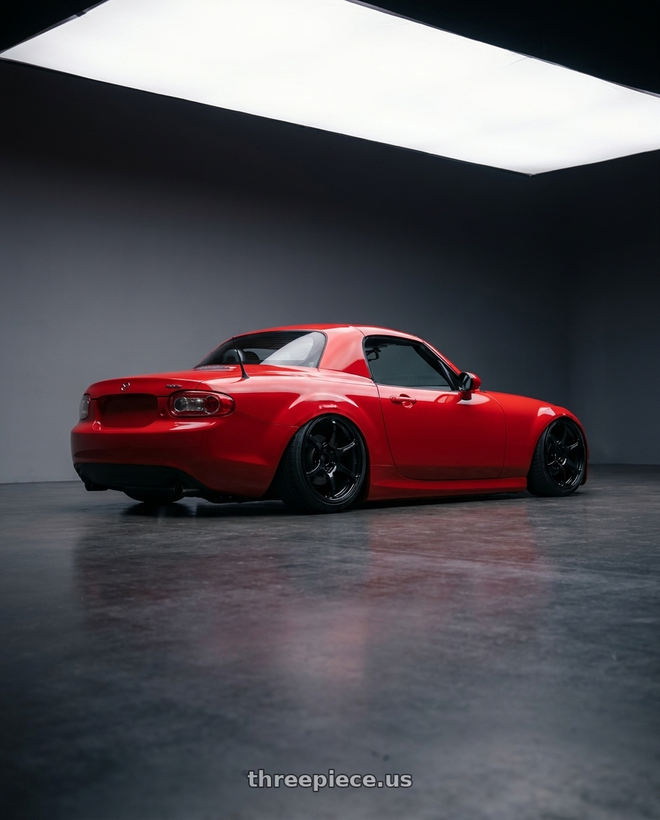 2012 Mazda MX-5 Miata NC with Advan RGIII 5x114.3 17x9.0+45 Gloss Black wheels rear three quarter view slight stretch tires