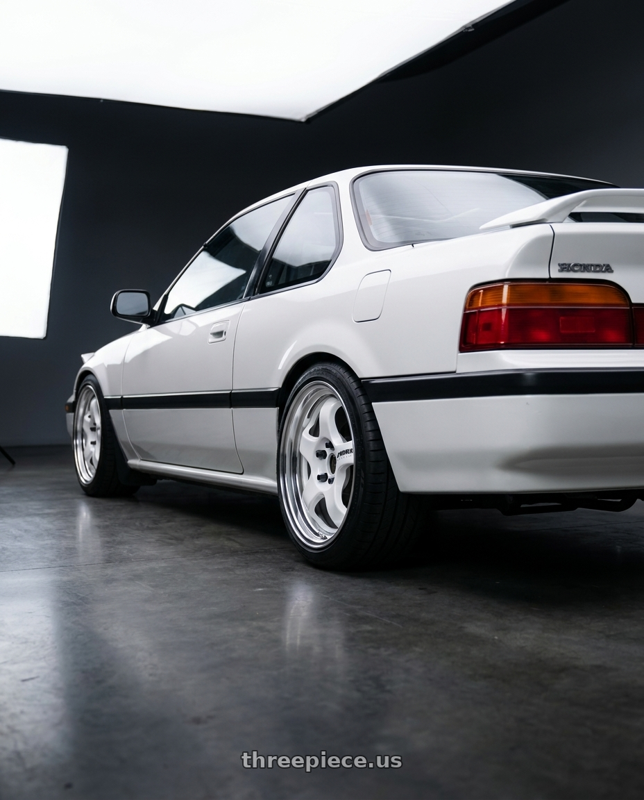 1991 honda prelude with Work Meister S1 2P 4x100 15x7+22 O Disk Black wheels rear three quarter view square tires