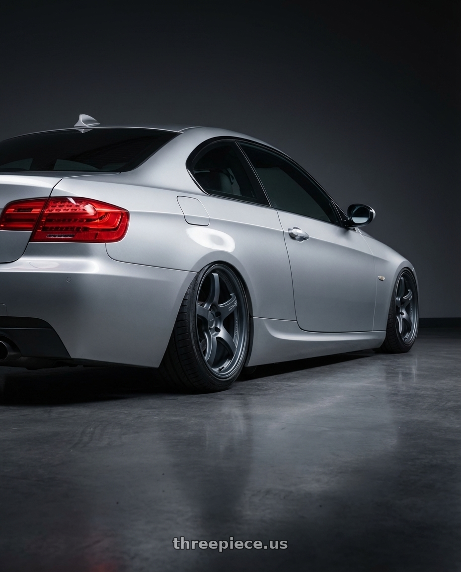 2012 BMW 3 Series E92 with Gram Lights 57CR 5x120 19x10.5+22 Gunblue II wheels rear three quarter view slight stretch tires