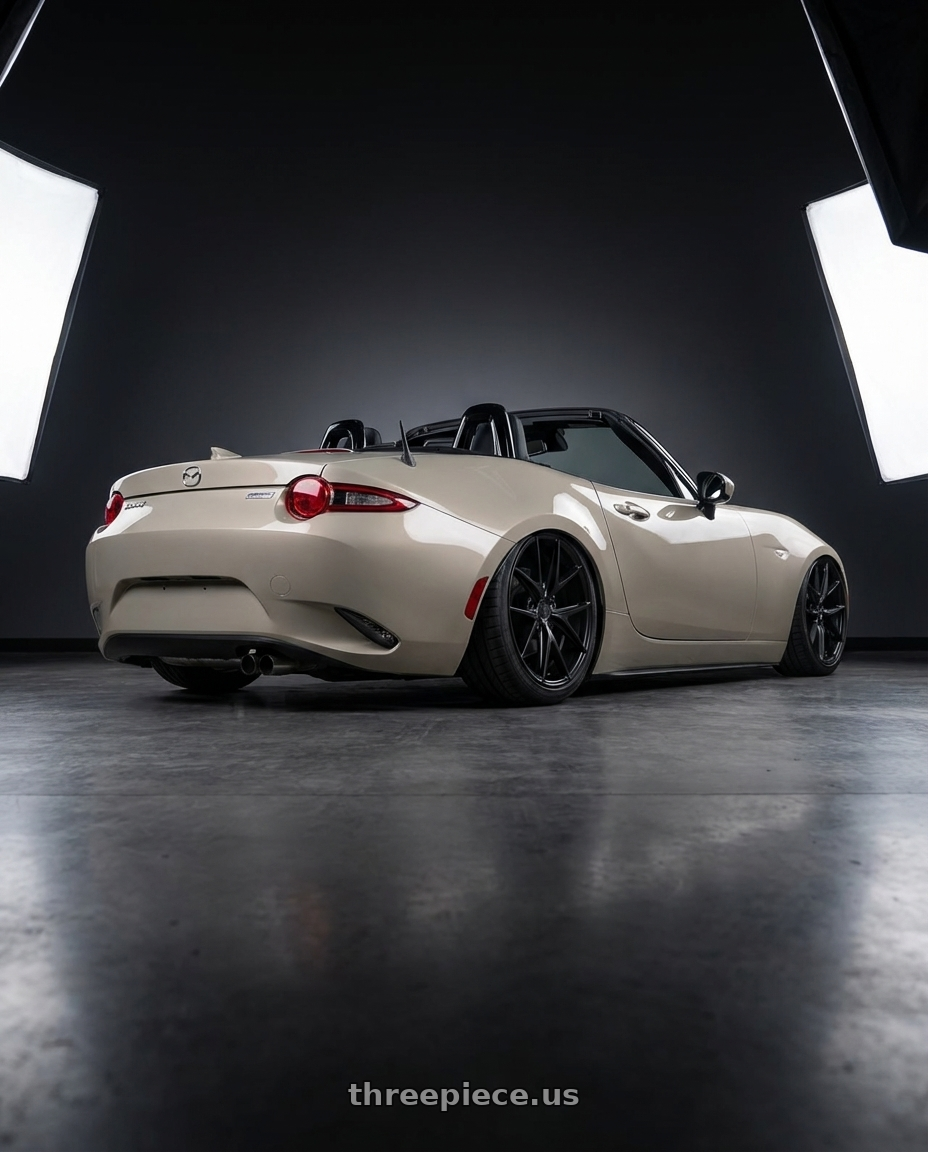2021 Mazda MX-5 Miata ND with Niche 1PC M117 MISANO 5X114.3 17X8 +40 MATTE BLACK wheels rear three quarter view slight stretch tires