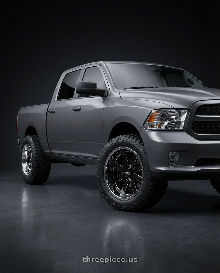 2024 Ram 1500 with Moto Metal MO200 6X139.7 22X12 -44 GLOSS BLACK MILLED CENTER CHROME LIP wheels front three quarter view stock stance