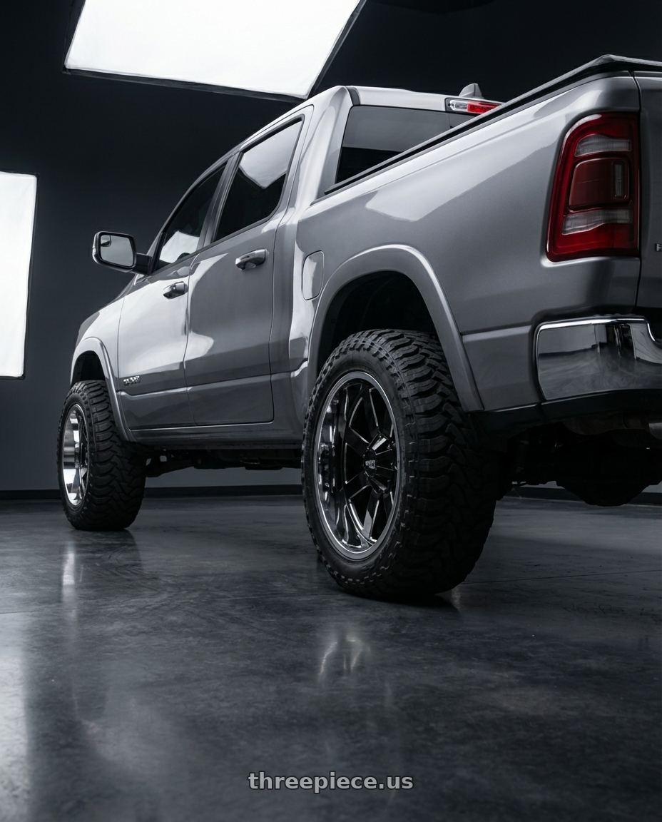 2024 Ram 1500 with Moto Metal MO200 6X139.7 22X12 -44 GLOSS BLACK MILLED CENTER CHROME LIP wheels rear three quarter view meaty tires