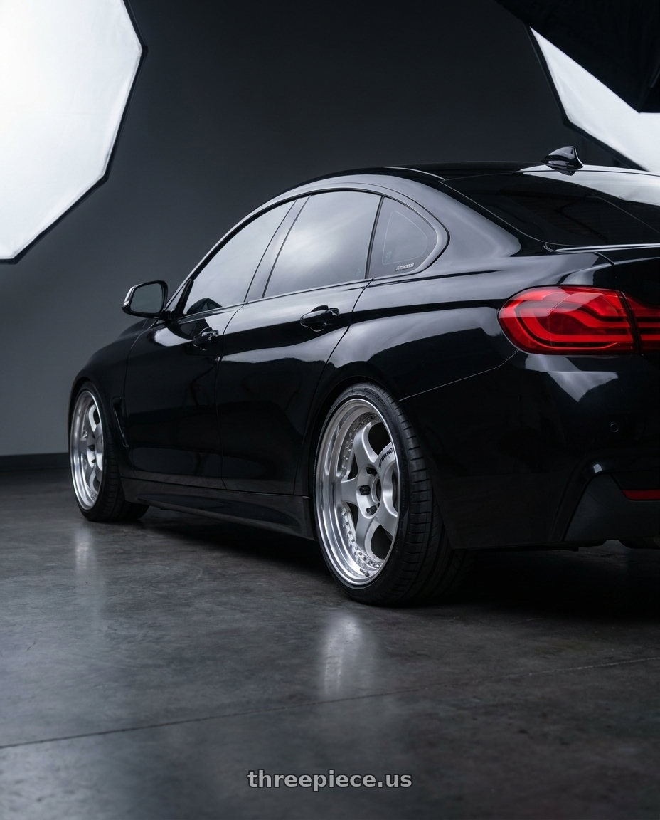 2019 BMW 440i gran coupe with Work Meister S1 3P 5x120 18x9.5+37 R Disk Silver wheels rear three quarter view square tires