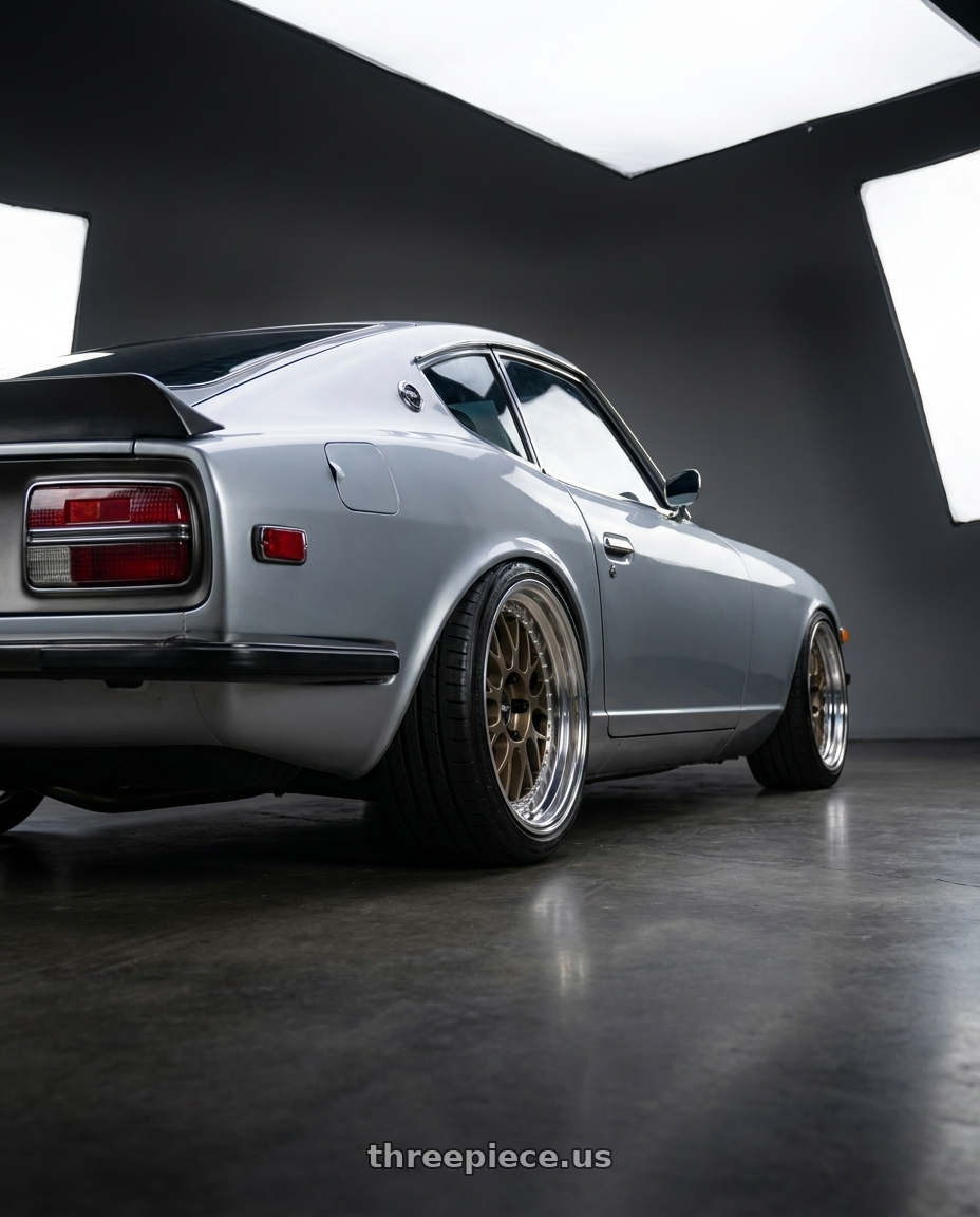 1974 Nissan 260z with Work Meister M1 3p 4x114.3 16x9+18 O Disk Titanium Gold wheels rear three quarter view square tires