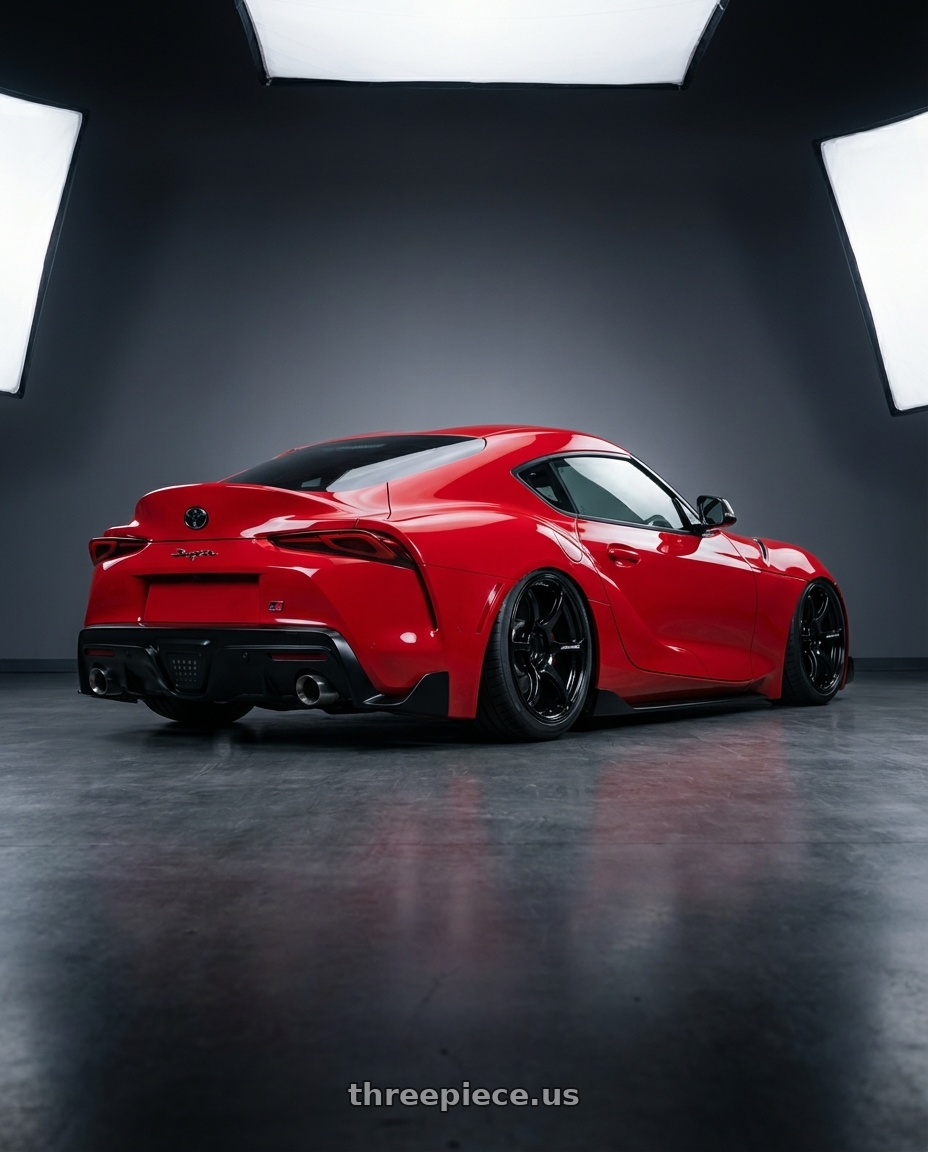 2023 Toyota GR Supra with Advan RGIII 5x112 19x8.5+45 Gloss Black wheels rear three quarter view slight stretch tires