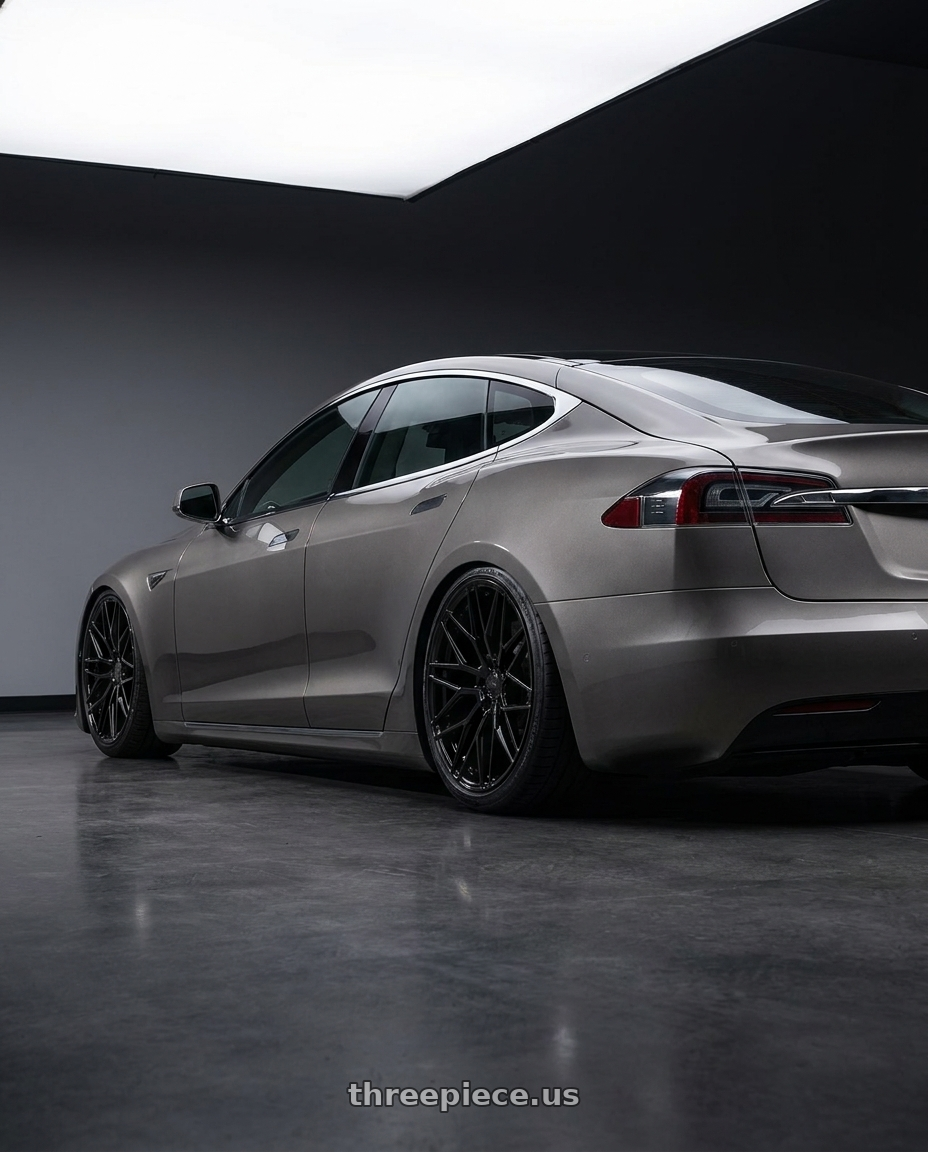 2018 Tesla Model S with Avant Garde Wheels M520R 5X120 21x12 +52 Gloss Black wheels rear three quarter view slight stretch tires