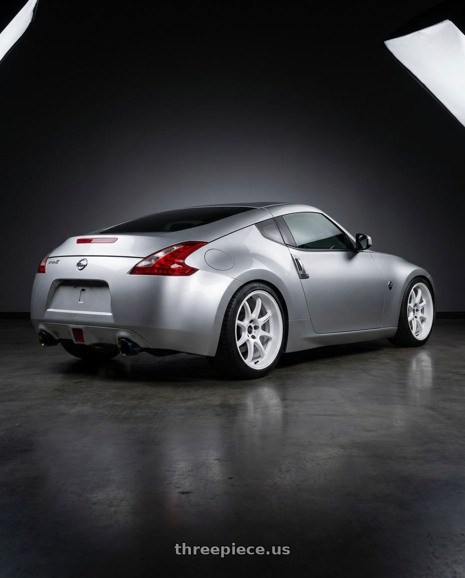 2015 Nissan 370z silver with Work Emotion D9r 5x114.3 19x8.5 +30 White wheels rear three quarter view square tires