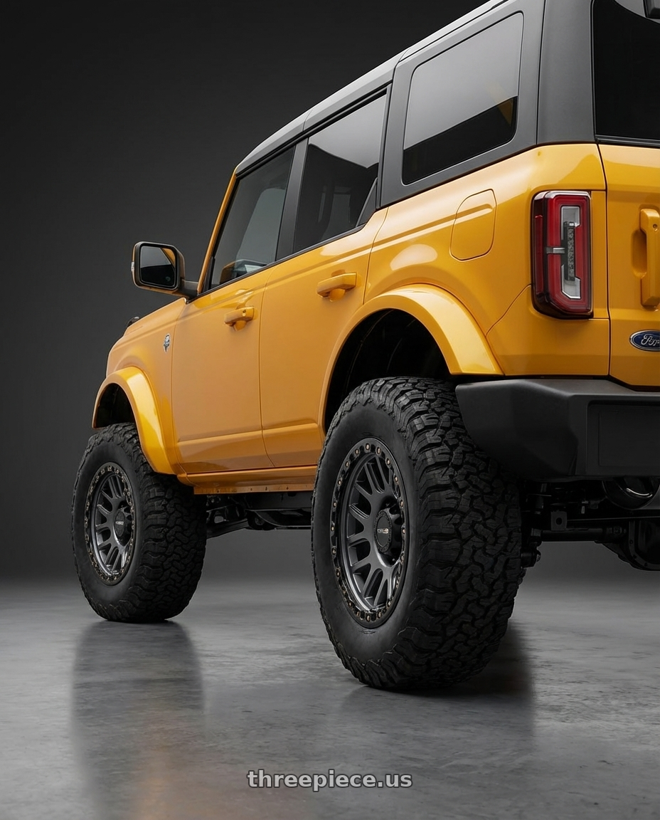 2024 Ford Bronco with Vision Off-Road 111 Nemesis 6x139.7 20x9+12 Gunmetal wheels rear three quarter view meaty tires