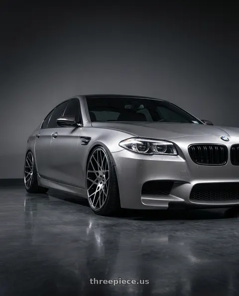 2015 BMW 550i xDrive with Strada Buca 5x120 22x9.5 +25 Gloss Black Machined wheels