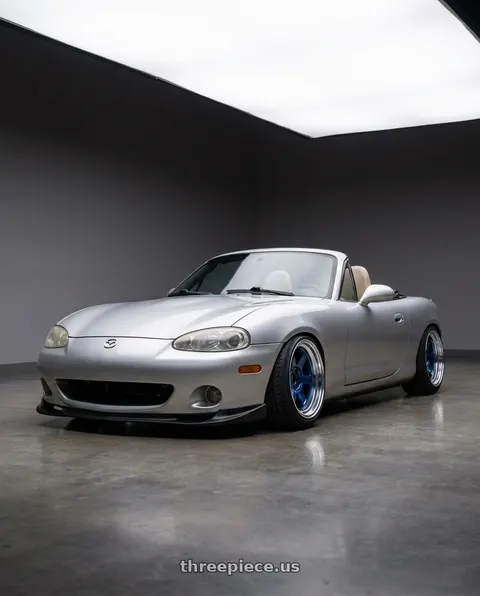 2000 Mazda Miata with Volk Racing TE37V 5x114.3 17x9.5 +15 MAG BLUE wheels