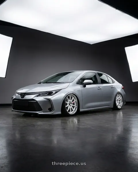 2025 Toyota Corolla with Work Zr10 2P 5x100 18x10.0 +45 Azure White wheels