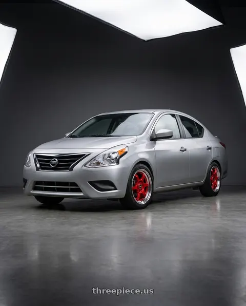 2019 Nissan Versa with Ns Wheels NS1202 4x100/4x114.3 15x7 +38 Red with Machined Lip wheels