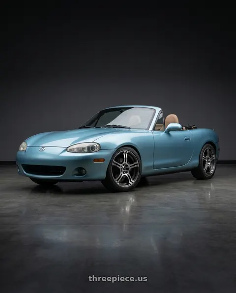 2002 Mazda Miata with Konig 48A Incident 4x100 / 4x108 14x6 +38 Graphite With Machined Face wheels