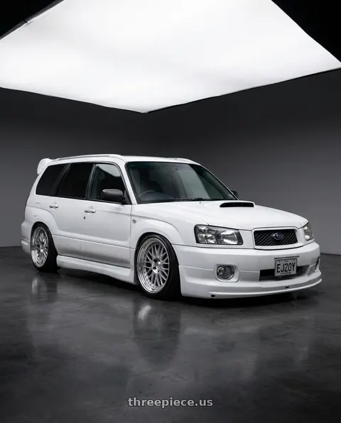 2002 Subaru Forester with Work Meister M1 3p 5x100 16x7+43 O Disk Silver wheels