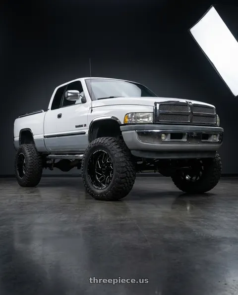 2001 Dodge Ram 1500 SLT with WELD Off-Road Fulcrum 5x139.7 20x9 0 Gloss Black/Milled wheels