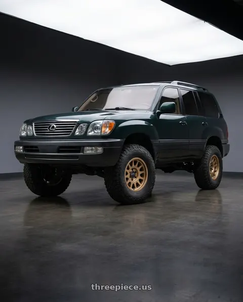 2005 Lexus LX470 with Method MR703 16x8 0mm Offset 6x5.5 106.25mm CB Method Bronze Wheel - MR70368060900 wheels