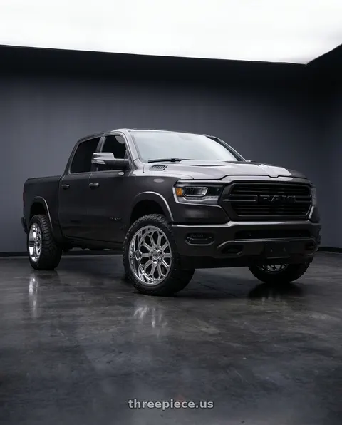 2021 Ram 1500 Laramie with Cali Off-Road Auburn 9117 6x139.7 22x12-51 Black/Milled wheels
