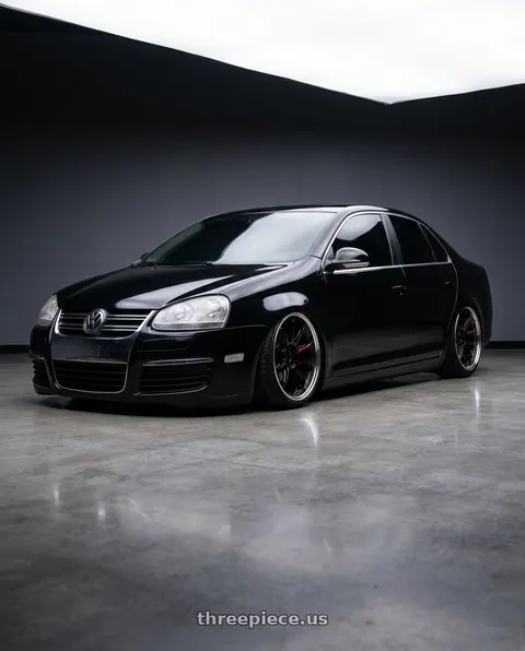 2007 Volkswagen Jetta with Work Zr10 2P 5x112 18x8.5 +45 Black wheels