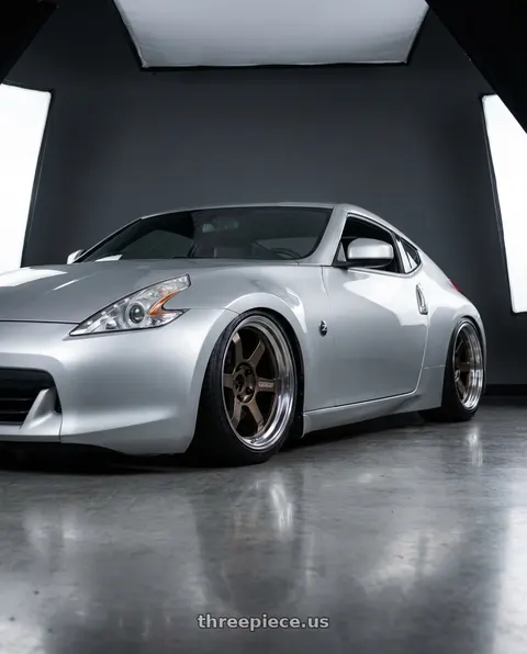 2009 Nissan 370Z with Volk Racing TE37V SPEC-SR 5x114.3 18x10.5+15 Shining Bronze Metal / FDMC wheels
