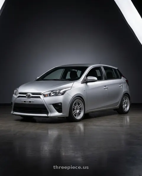 2015 Toyota Yaris with Enkei RPF1 4x100 15x8+28 Silver wheels