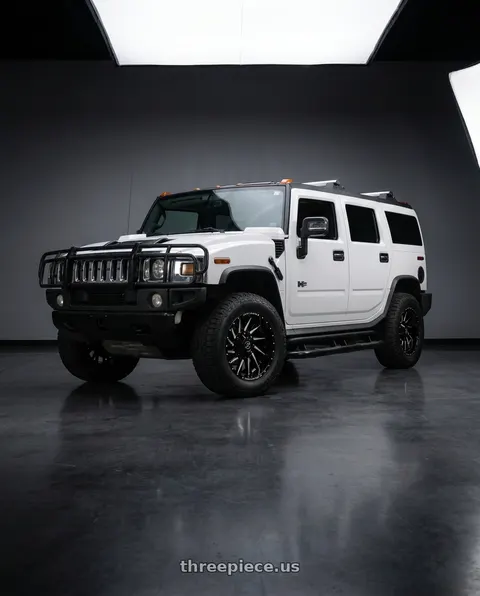 2004 Hummer H2 with XF Off-Road XF-226 8x165.1/8x170 20x9 +12 Gloss Black & Milled wheels