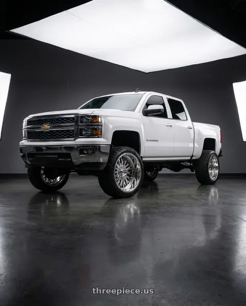 2015 Chevrolet Silverado 1500 with Strada Spina 5x100/5x114.3 20x8 +40 Chrome wheels