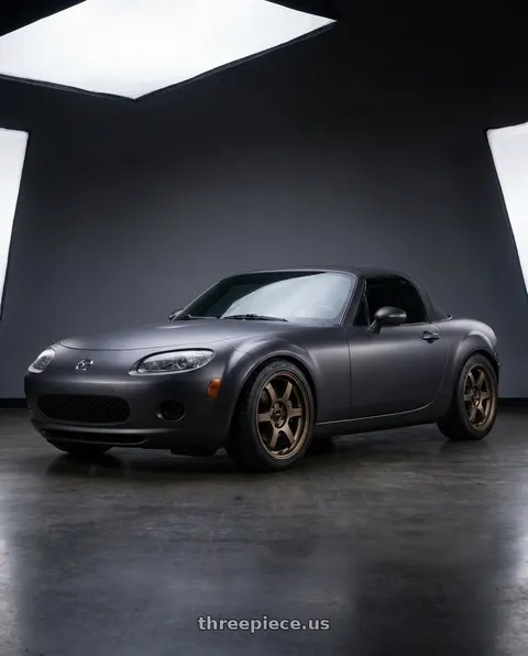 2007 Mazda Miata MX-5 with Gram Lights 57DR-X2 5x114.3 16x7+40 Dark Bronze wheels