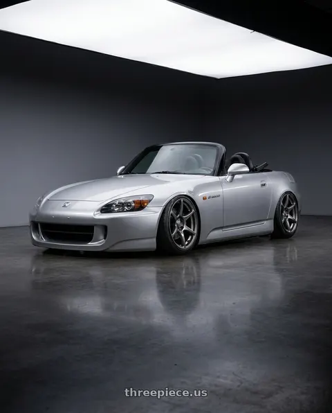 2009 Honda S2000 with Kansei K11G Tandem 5x114.3 18x9 12 Gunmetal wheels