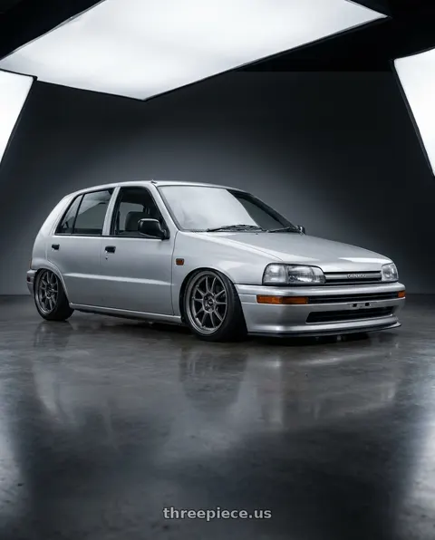 1995 Daihatsu charade 4door g200 with Vision Street-Designs 18 Hellion 4x114.3 15x6.5+38 Gunmetal wheels