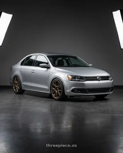2016 Volkswagen Jetta with Konig Ampliform 5x112 18x8.5+43 Gloss Bronze wheels