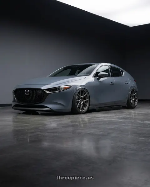 2023 Mazda 3 with Konig Ampliform 5x114.3 18x10+20 Dark Metallic Graphite wheels