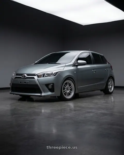 2015 Toyota Yaris with Enkei RPF1 4x100 16x8+38 Silver wheels