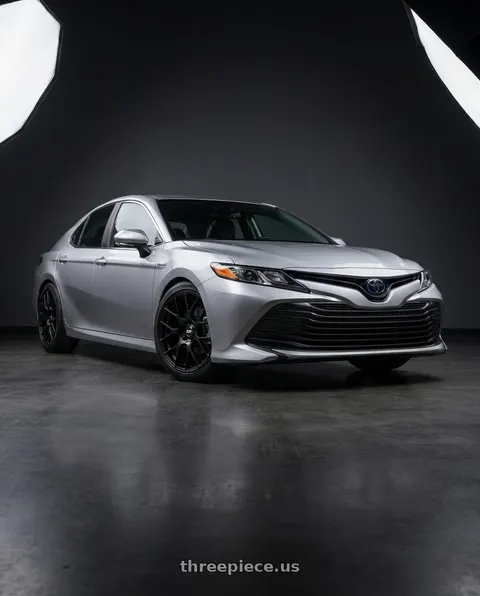 2021 Toyota Camry Hybrid LE with Enkei Raijin 5x114.3 19x8.5+35 Black wheels
