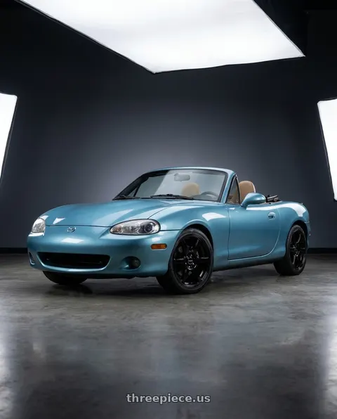 2002 Mazda Miata with Raceline 146B Matrix 4X100/4x114.3 14x5.5 35 Gloss Black wheels