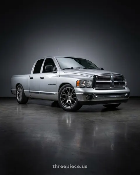 2004 Dodge Ram 1500 with OE Wheels DG15 5x115 20x9+18 Gloss Hyper Black wheels