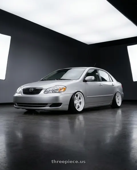 2003 Toyota Corolla with 9six9 SIX-1 Deep 4x100 15X8 +20 Competition White wheels