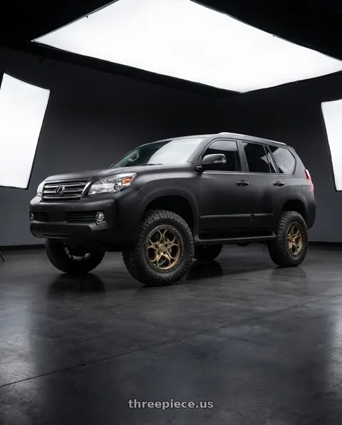 2012 Lexus GX460 with WELD Off-Road Ledge 6x139.7 20x9 0 Satin Bronze / Satin Black wheels