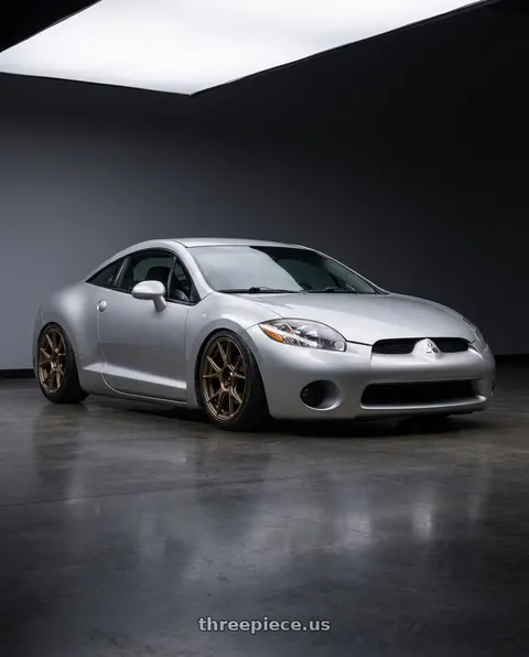 2010 Mitsubishi Eclipse with Konig Ampliform 5x114.3 18x8.5+35 Gloss Bronze wheels
