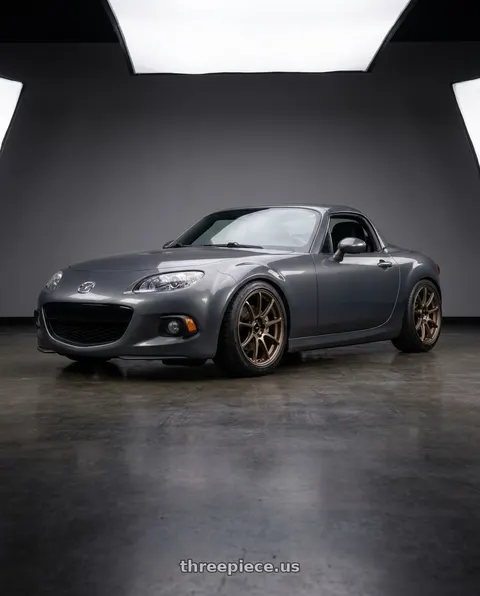 2014 Mazda MX-5 Miata with Enkei Triumph 5x100 17x9+45 Matte Bronze wheels
