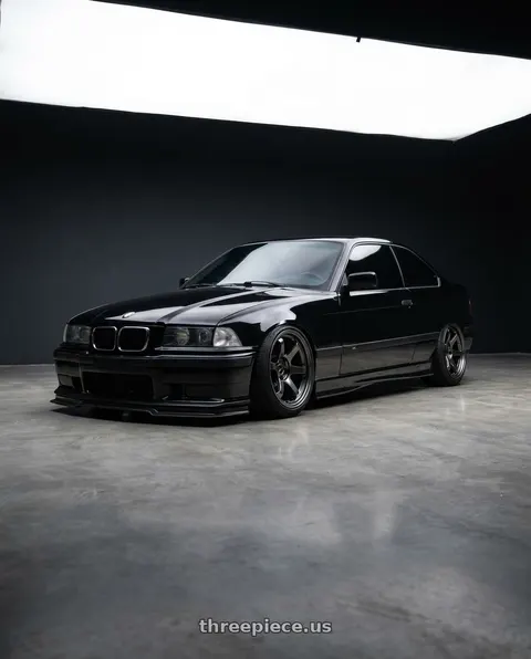 1993 BMW 325i with Enkei PF06 5x114.3 16x8+30 Black Machined wheels