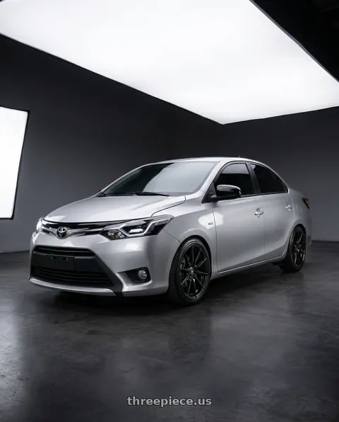 2016 Toyota Yaris with Konig Oversteer 5x114.3 18x9+35 Gloss Black wheels