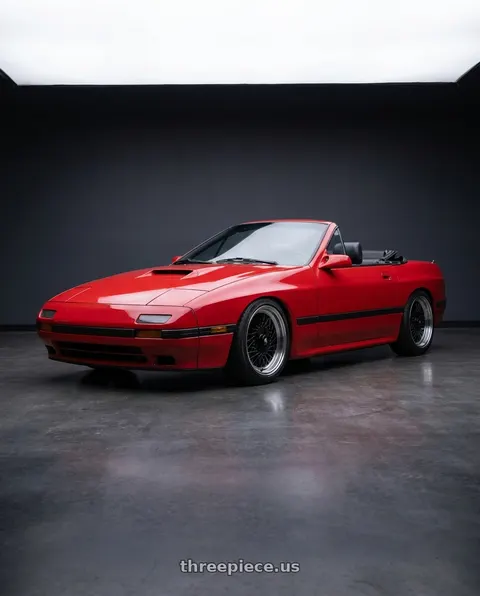 1988 Mazda RX-7 with Enkei Enkei92 Classic Line 5x114.3 15x7+38 Black wheels