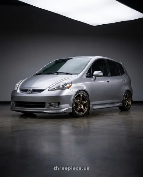 2007 Honda Fit Sport with Advan Racing TC4 4x100 15x7.0 +42 UMBER BRONZE METALLIC & RING wheels